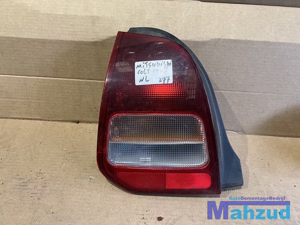 MITSUBISHI COLT 5 links achterlicht left backlight, Auto-onderdelen, Verlichting, Mitsubishi, Gebruikt, Ophalen of Verzenden