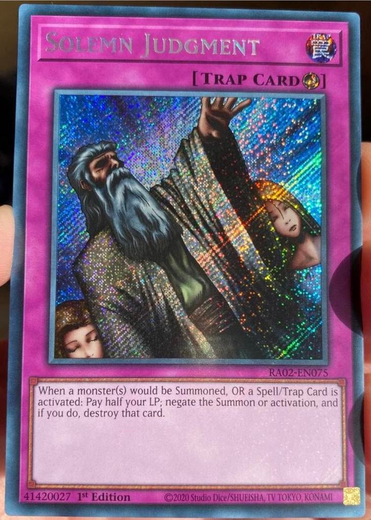 Yu-Gi-Oh! Solemn Judgment RA02 1st Edition !, Ophalen of Verzenden, Zo goed als nieuw, Losse kaart, Foil