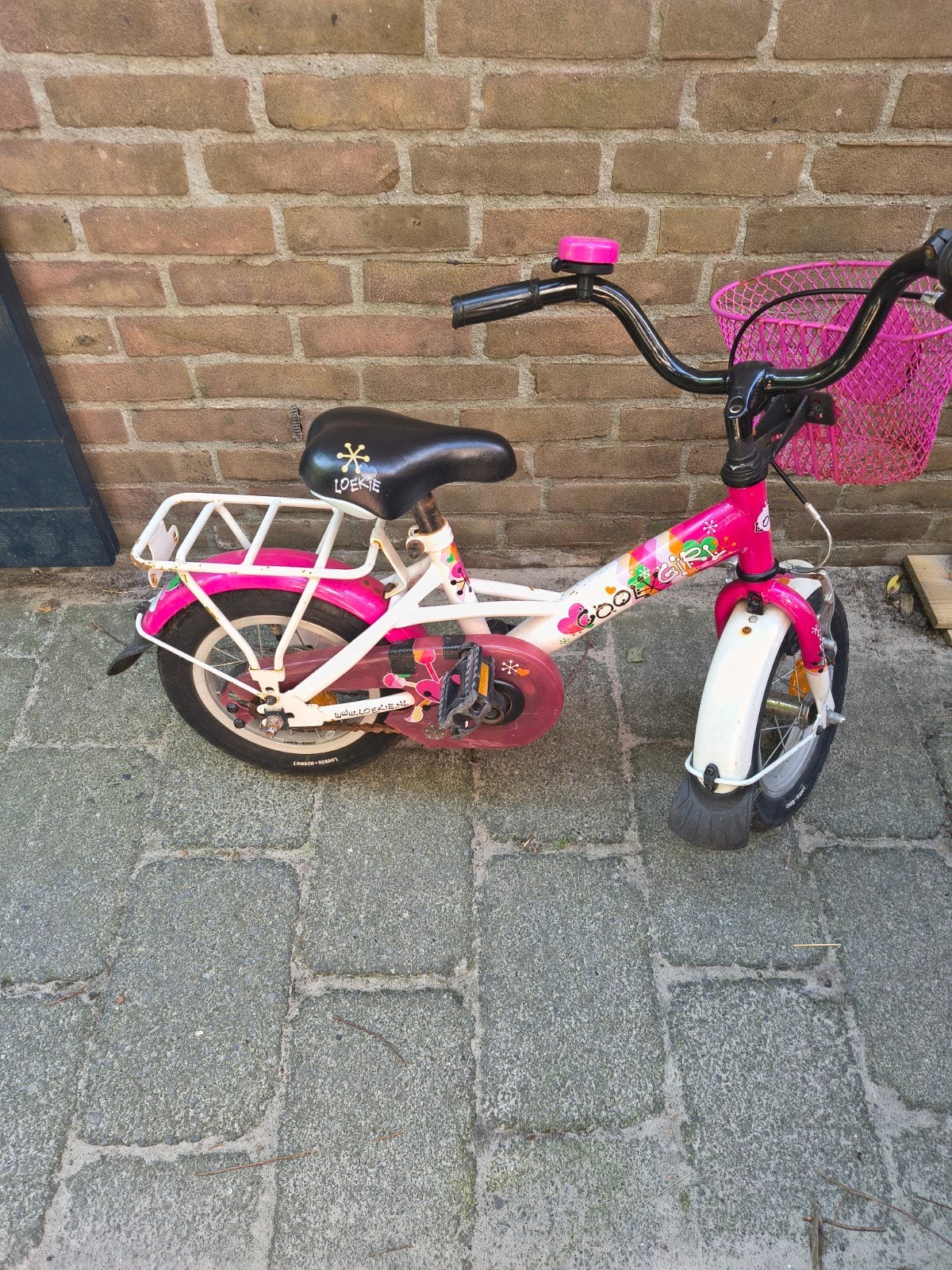 Roze kinderfiets Loekie Coolgirl 12 inch met mandje, Ophalen, Gebruikt, Velgrem, Loekie