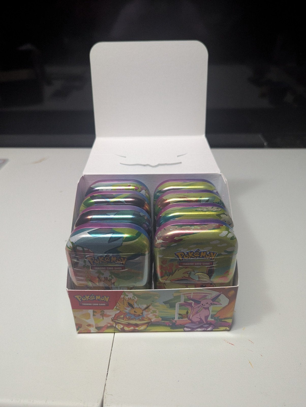 Pokémon Prismatic Evolutions Mini Tin Display (Unsealed), Ophalen of Verzenden, Zo goed als nieuw