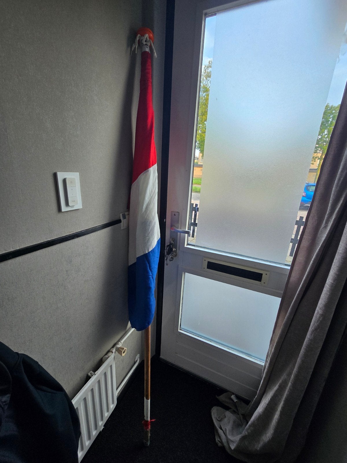 Nederlandse vlag met stok