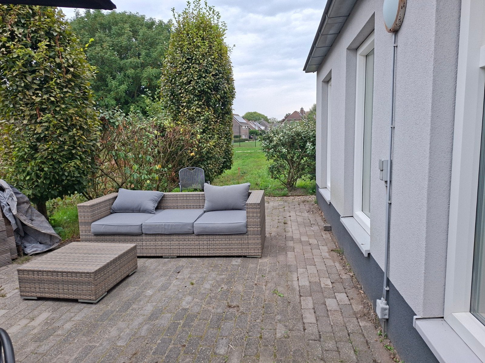 Foto 4 van Grote parasol en loungeset