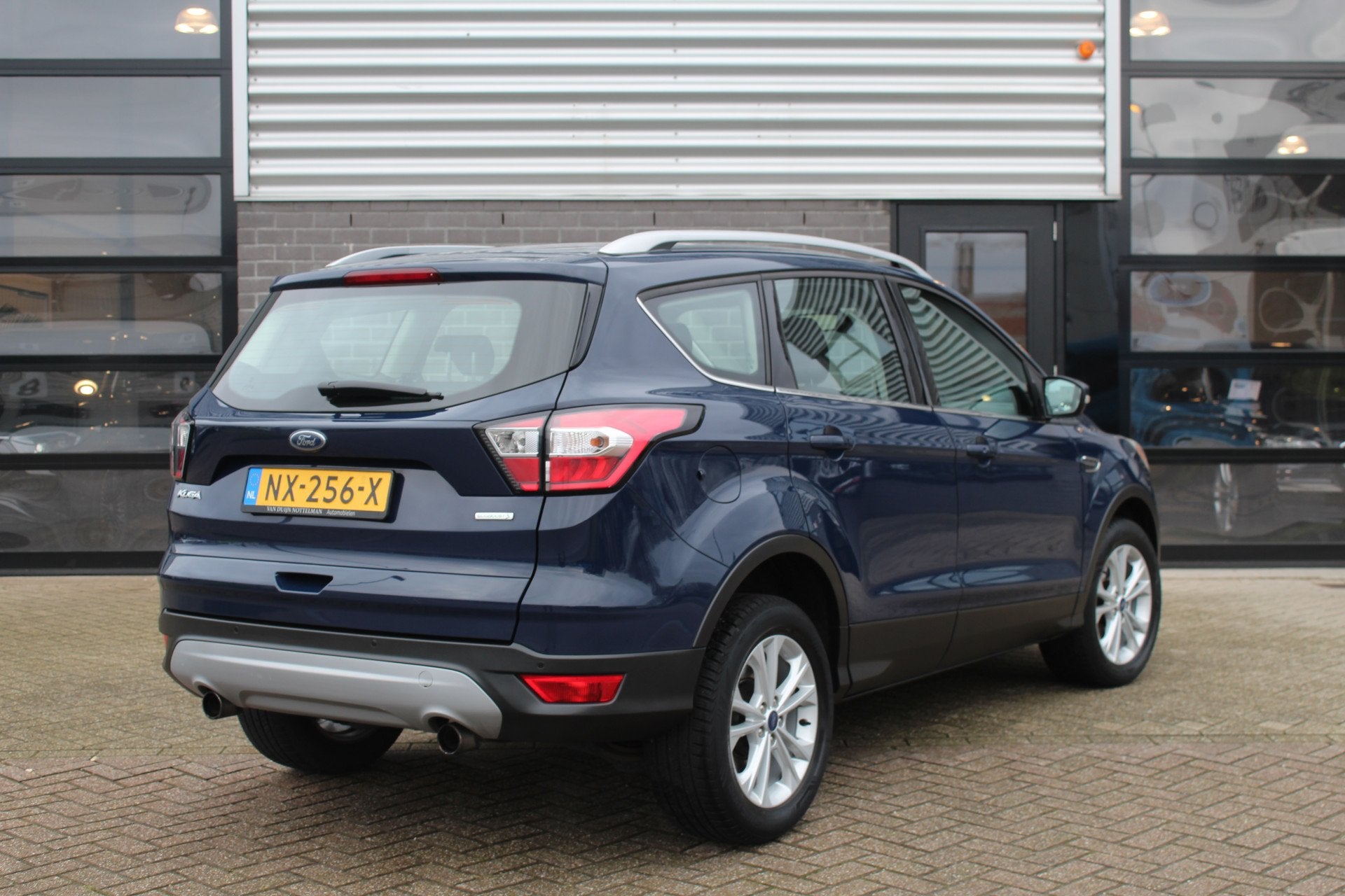 Ford Kuga 1.5 EcoBoost Titanium / Carplay / Keyless / N.A.P., Auto's, Ford, 4 cilinders, Met garantie (alle), Blauw, Leder en Stof