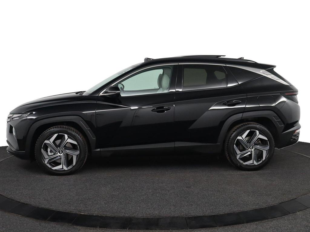 Hyundai Tucson 1.6 T-GDI HEV Premium Sky | Automaat | Bomvol, Auto's, Gebruikt, Euro 6, 4 cilinders, 1650 kg