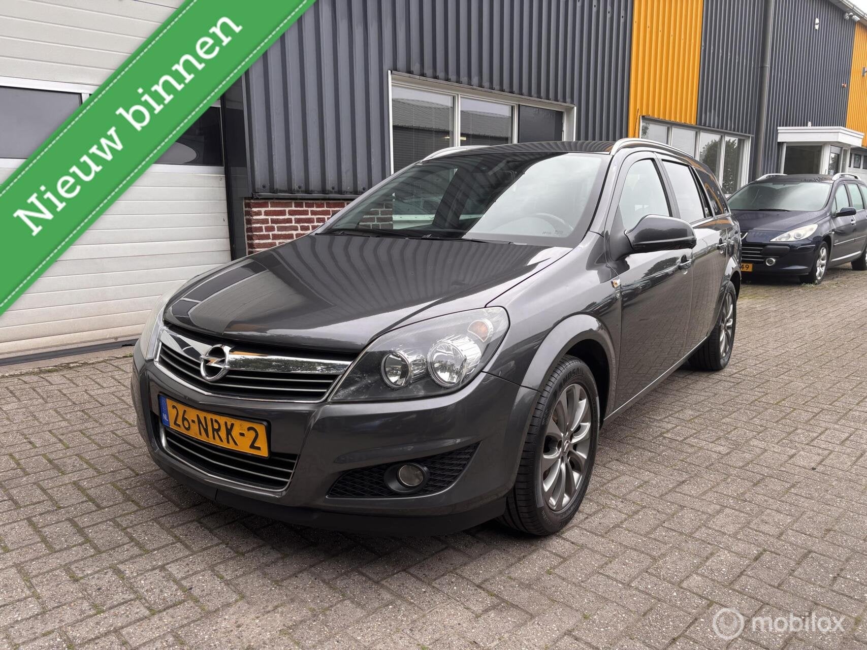 Opel Astra Wagon 1.6 111 years Edition TREKHAAK!, Voorwielaandrijving, Euro 5, 15 km/l, Gebruikt