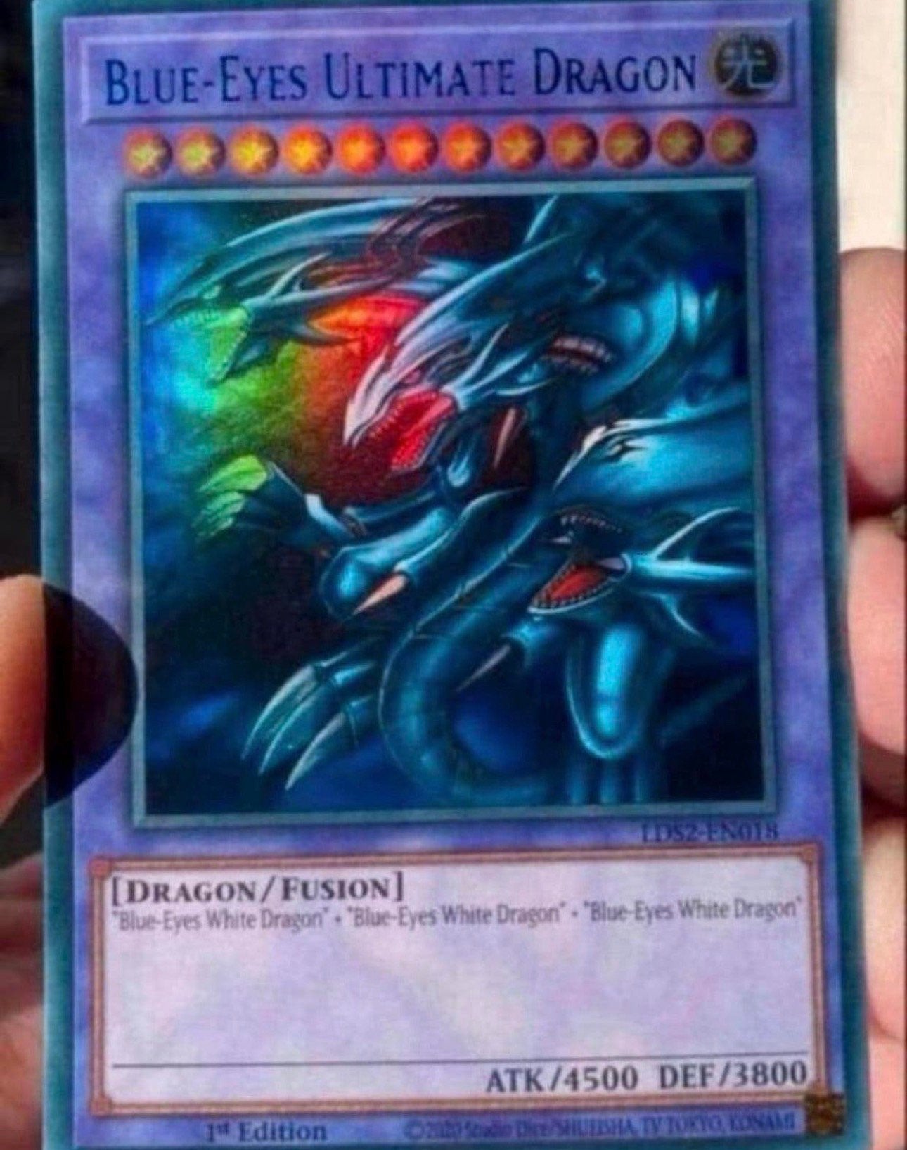 Yu-Gi-Oh! Blue Eyes Ultimate Dragon LDS2 1st Edition !, Hobby en Vrije tijd, Ophalen of Verzenden, Gebruikt, Losse kaart, Foil