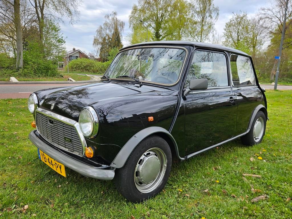 Mini 1000 1.0 E K9 1990 Zwart, Auto's, Voorwielaandrijving, Stof, Overige modellen, Zwart