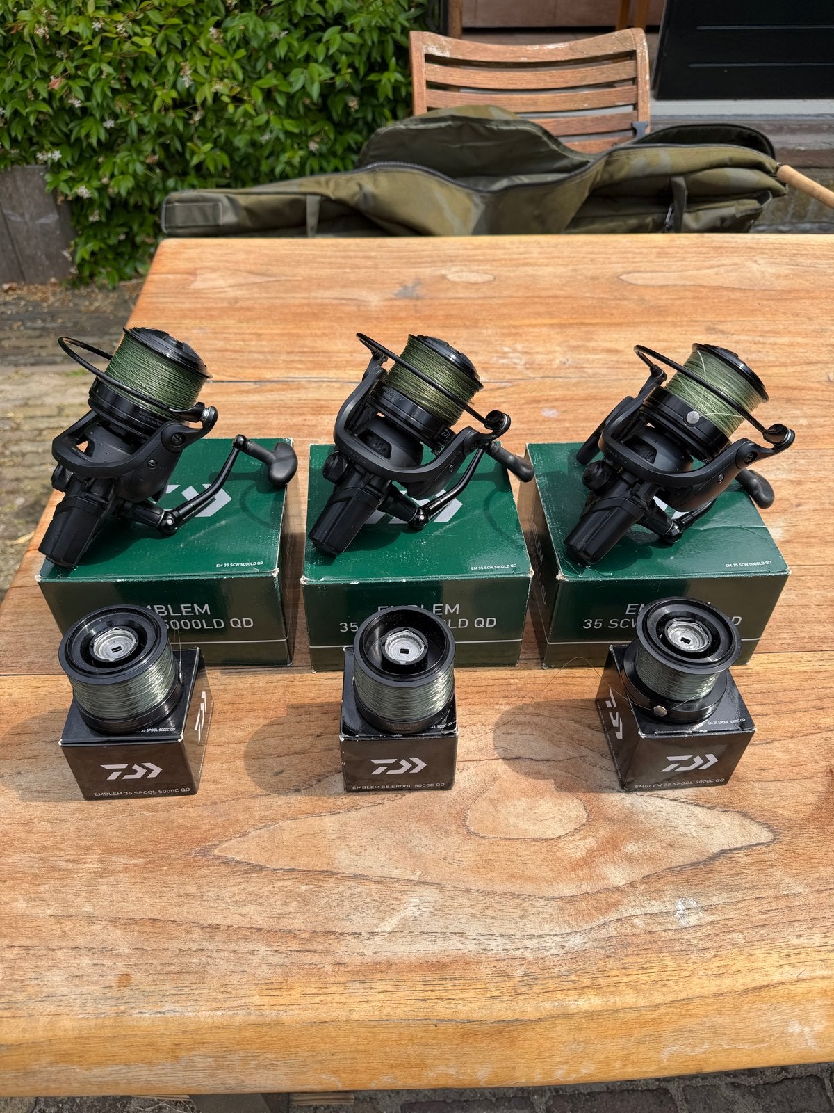 Daiwa Emblem 35 SCW 5000LD QD Molens (Set van 3), Ophalen of Verzenden, Gebruikt, Molen