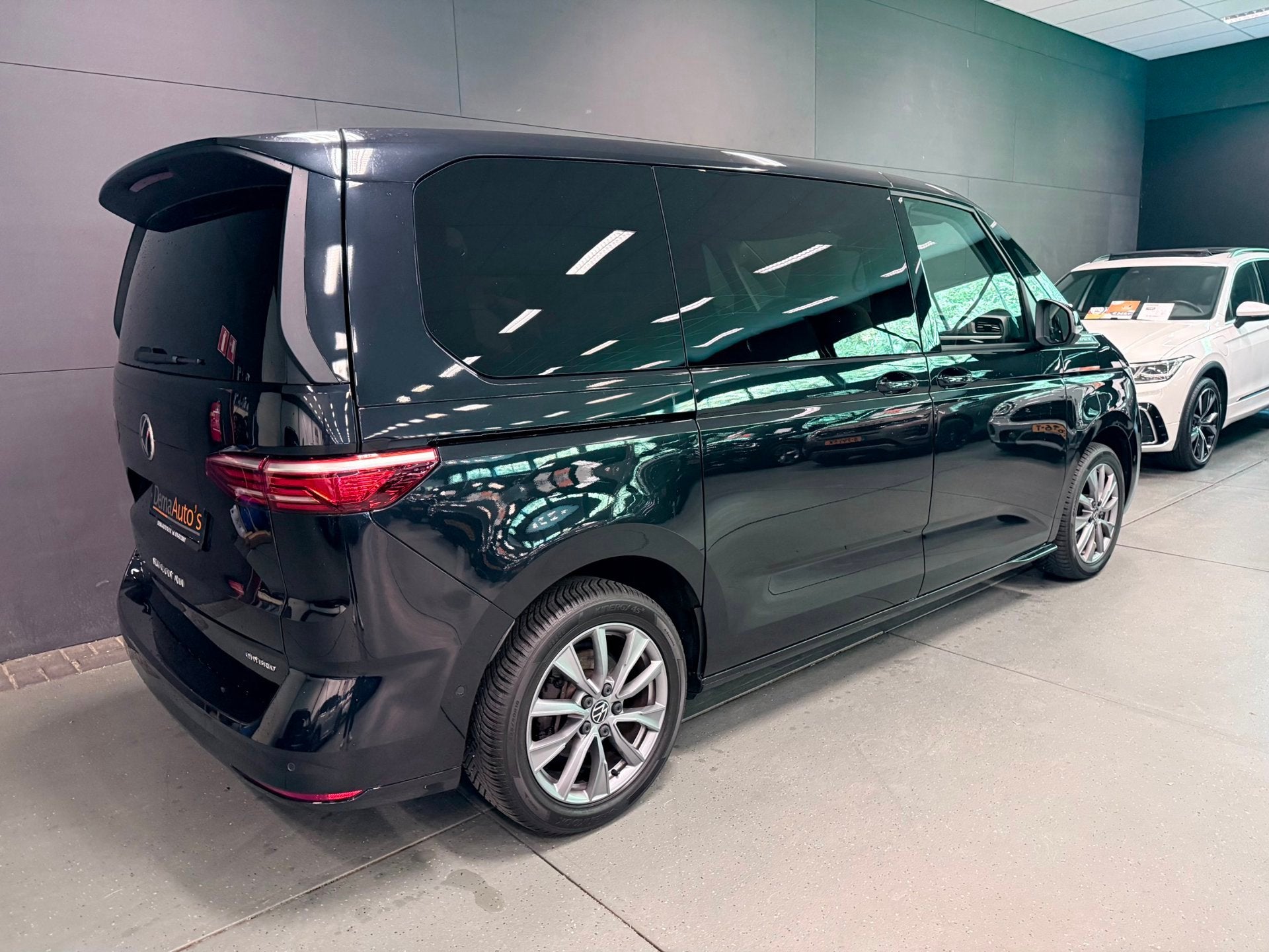 Volkswagen Multivan 1.4 eHybrid Energetic 6P PANO/NAVI/H-KAR, Stof, Gebruikt, Zwart, Grijs