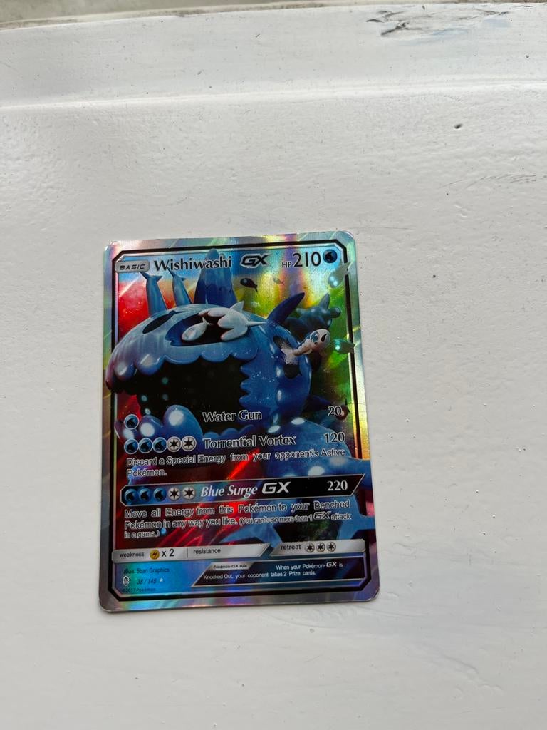Wishiwashi GX Pokémon kaart - Licht beschadigd, collectors i, Ophalen of Verzenden, Gebruikt, Losse kaart