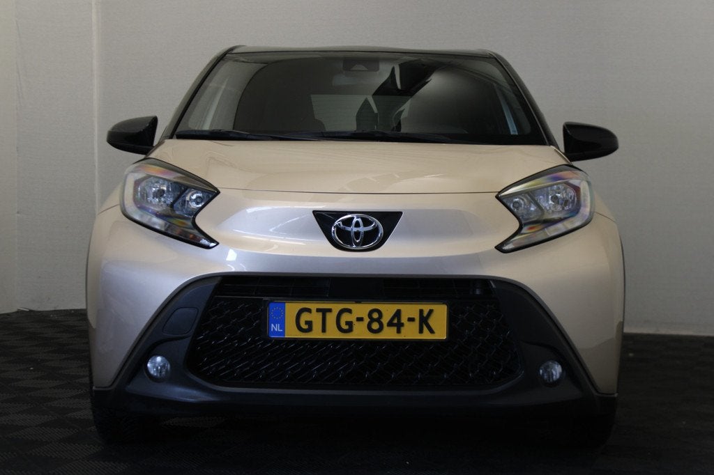 Toyota Aygo X 1.0 VVT-i MT Pulse |Camera|Stoelverw.|, Stof, Gebruikt, Bruin, 4 stoelen