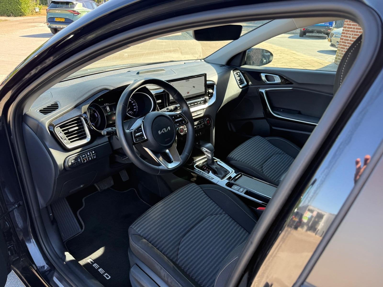 Kia Ceed Sportswagon 1.6 GDi 141PK PHEV DynamicPlusLine 1ste, Auto's, Dealer onderhouden, Gebruikt, Zwart, Zwart