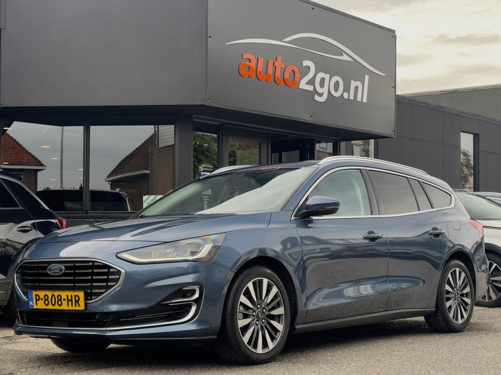Ford Focus Wagon Vignale 1.0 AUT7 ECOBOOST HYBRID TITANIUM L, Gebruikt, Blauw, 19 km/l, Hybride Elektrisch/Benzine