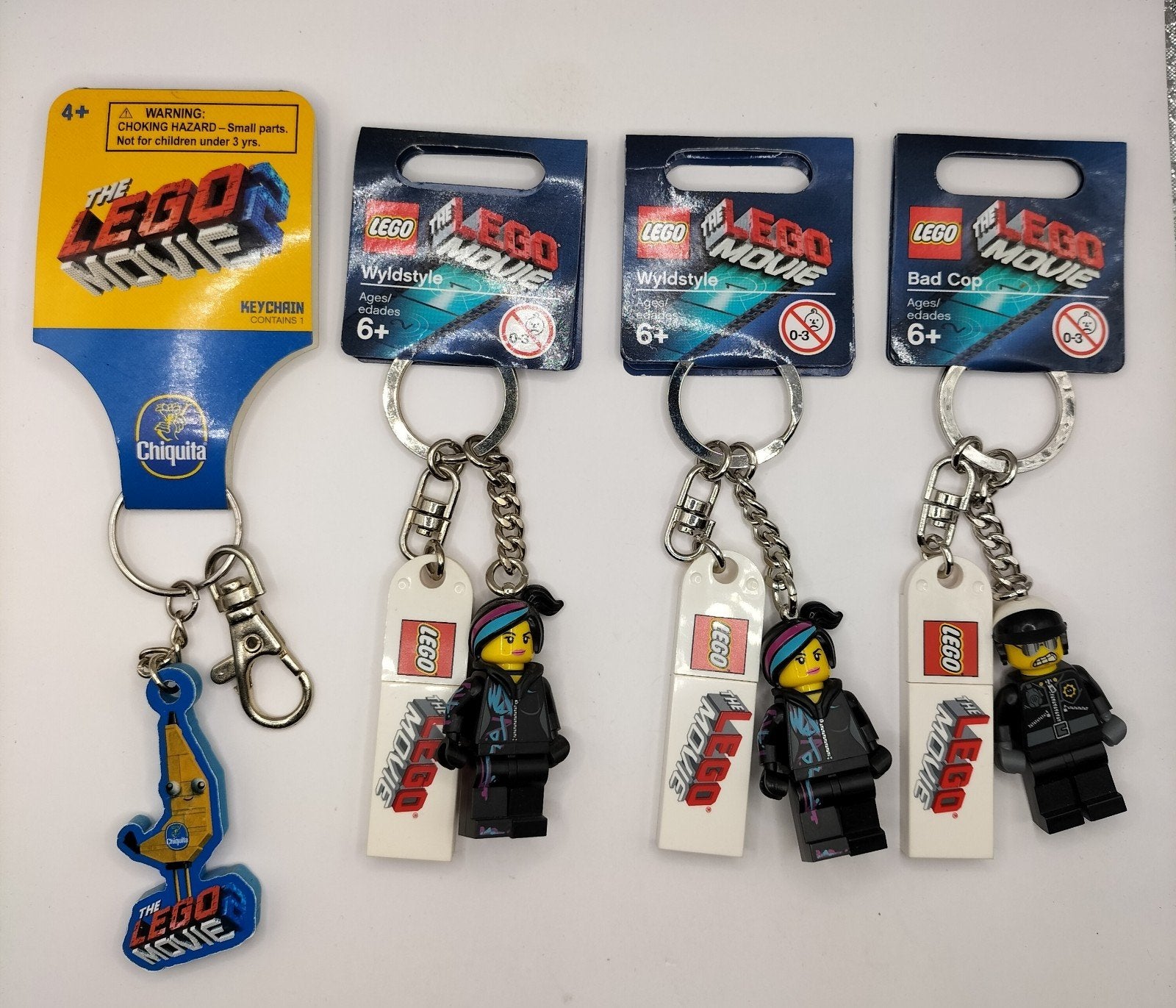 Lego Movie sleutelhangers - Wyldstyle & Bad Cop, Ophalen of Verzenden, Nieuw
