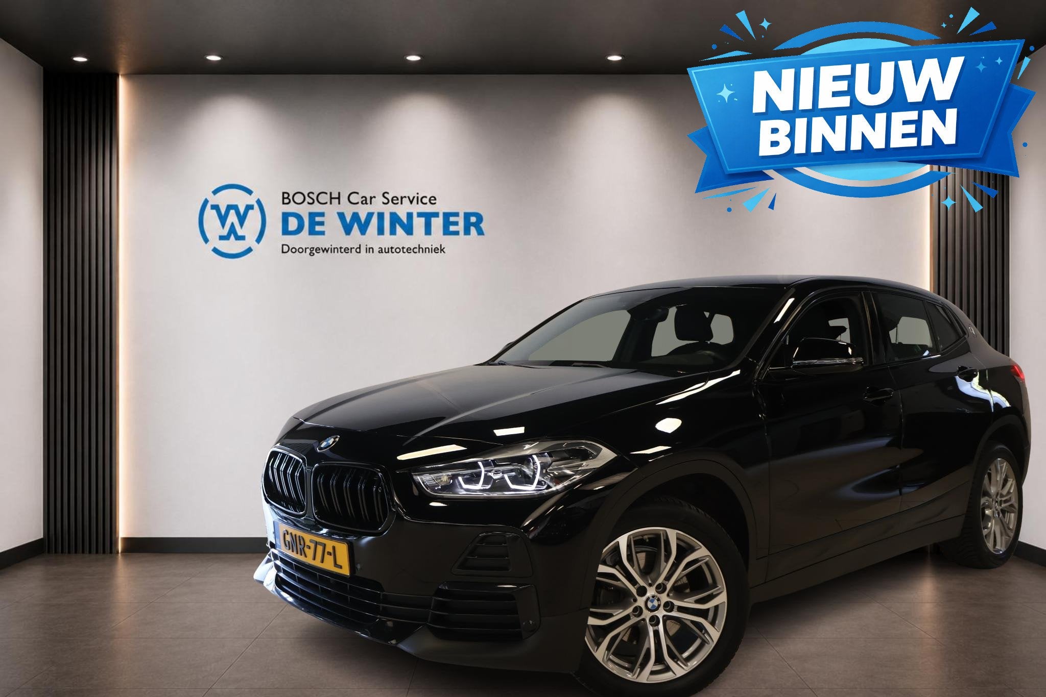 BMW X2 sDrive18i High Executive, Gebruikt, Met garantie (alle), Zwart, Leder