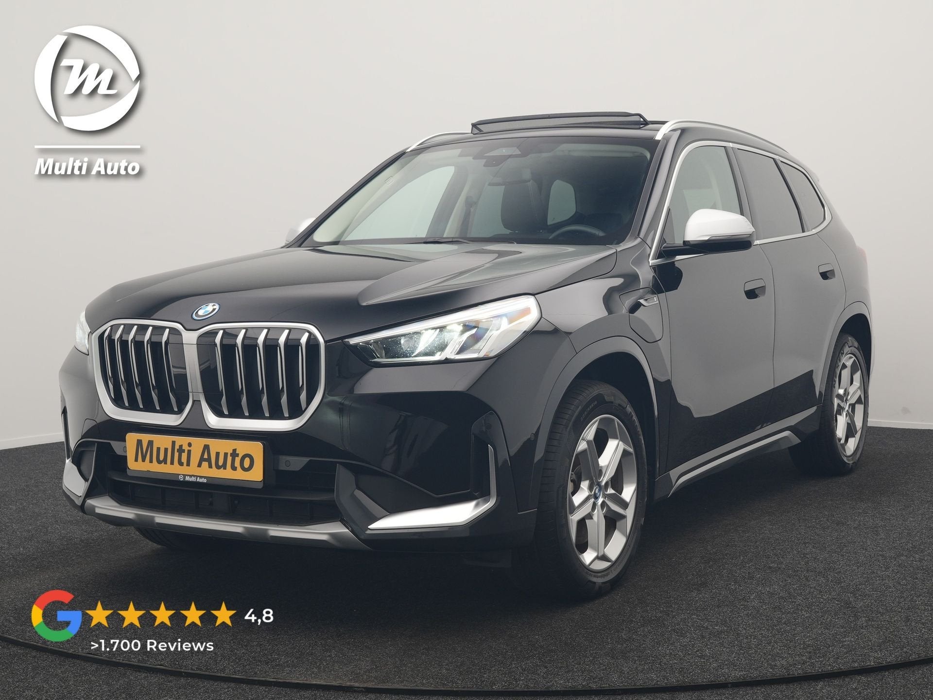 BMW X1 xDrive30e X Line PHEV 326pk Dealer O.H. | Trekhaak Af, Auto's, Dealer onderhouden, Zwart, Zwart, Bedrijf