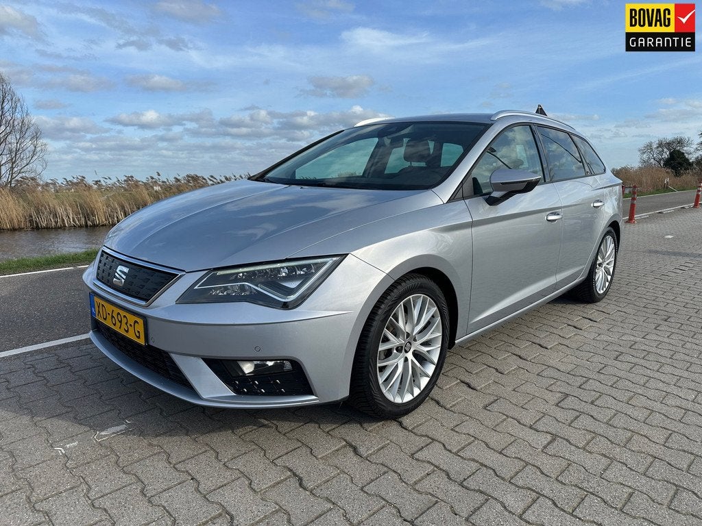Seat Leon ST 1.0 EcoTSI Style Business Intense, Trekhaak, Le, Auto's, Stof, Gebruikt, Met garantie (alle), Leon