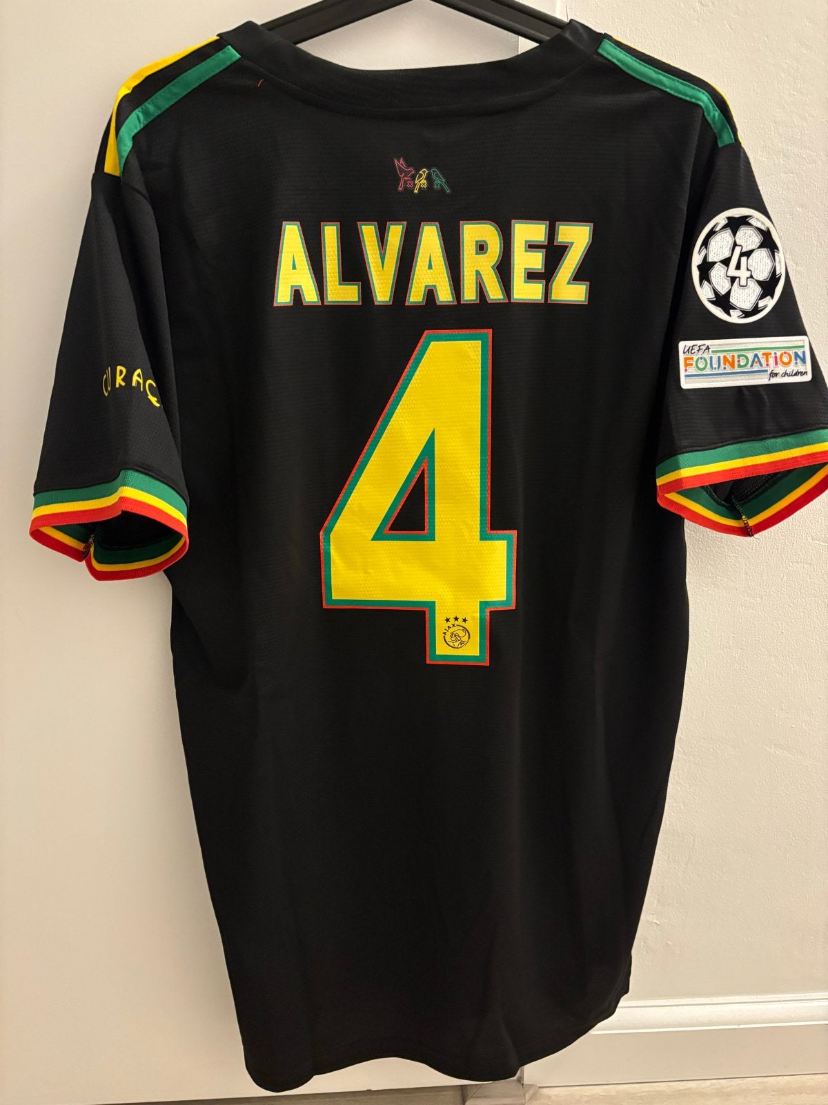 Retro Ajax uitshirt 2022/2023 Alvarez large bob marley ziggo, Maat 52/54 (L), Zwart, Nieuw, Ophalen of Verzenden