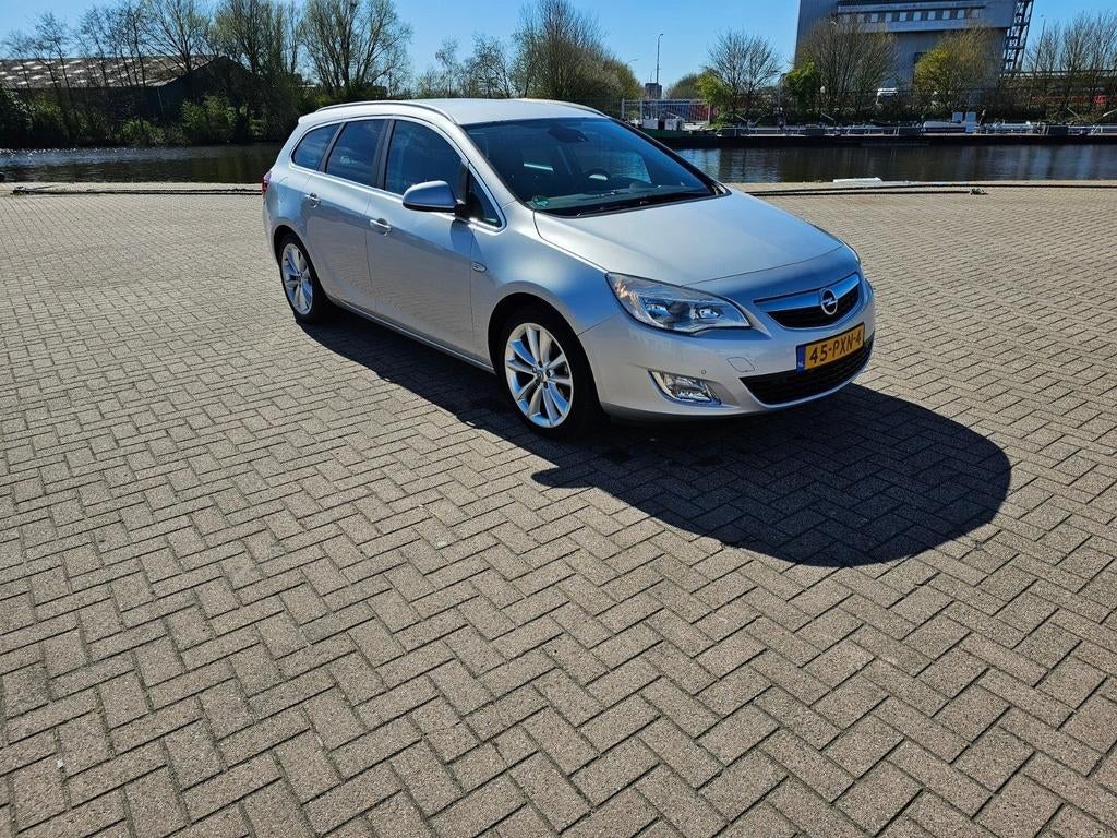 Opel Astra 1.4 Turbo 103KW ST 2011 Grijs, Auto's, Voorwielaandrijving, Euro 5, Stof, Zwart