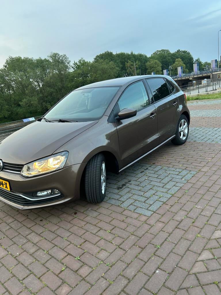 Volkswagen Polo 1.2 TSI 66KW 2014 Bruin, Auto's, Volkswagen, 40 €/maand, 4 cilinders, Bruin, Handgeschakeld