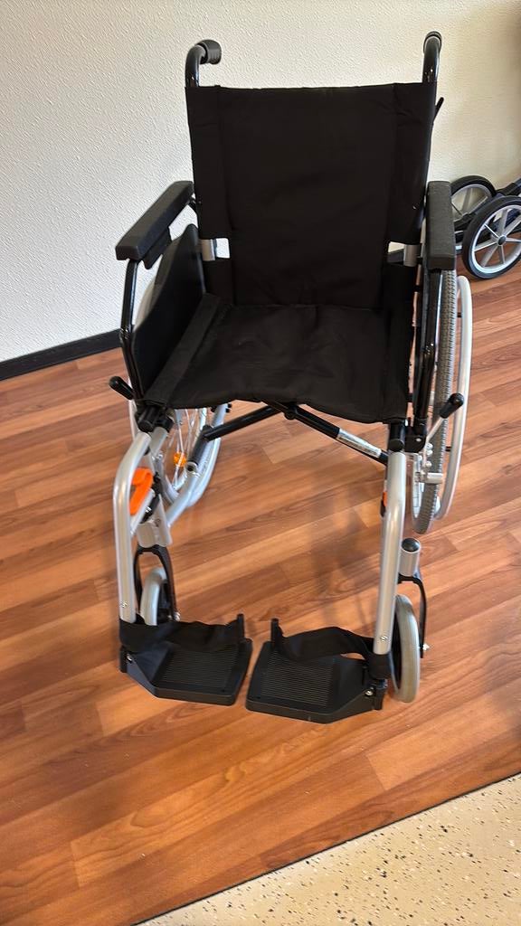 Rolstoel, Ophalen, Duwrolstoel