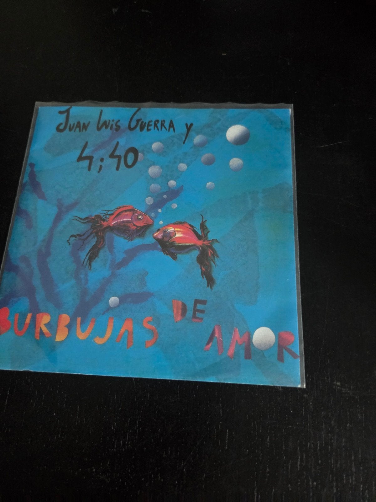 Juan Luis Guerra - Burbujas de Amor (7 inch vinyl single), Cd's en Dvd's, Ophalen of Verzenden