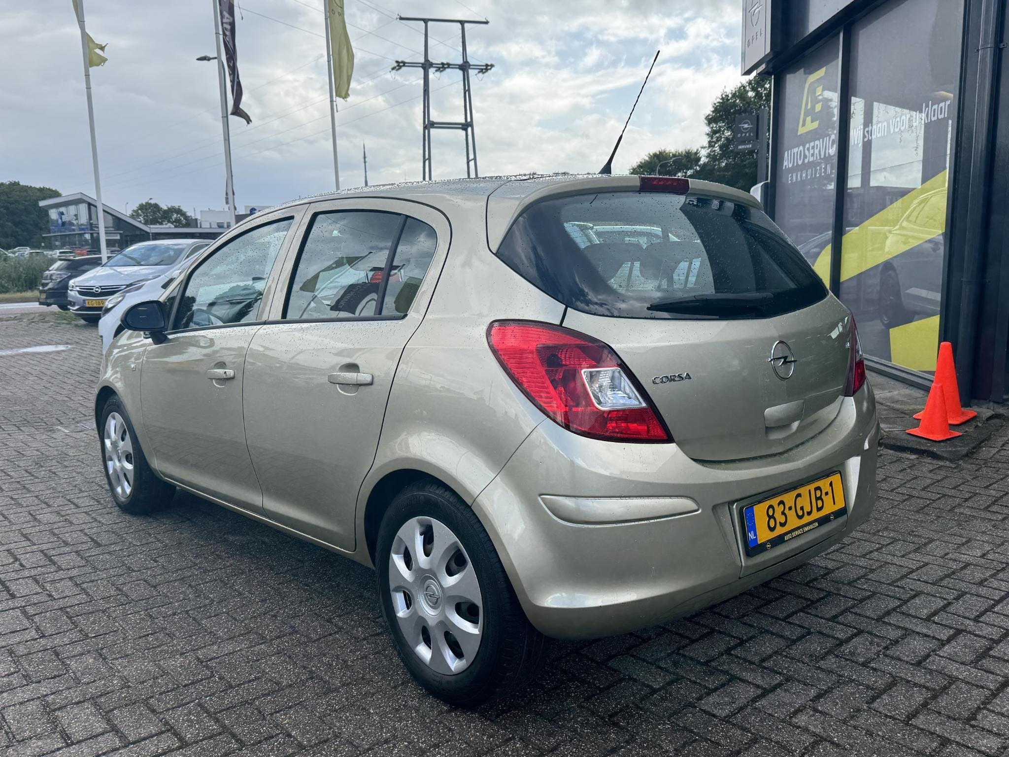 Opel Corsa 1.4-16V Enjoy, Auto's, Voorwielaandrijving, Gebruikt, 4 cilinders, Origineel Nederlands
