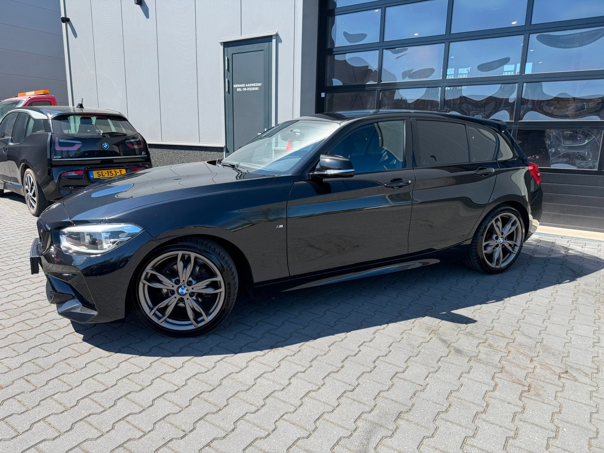 BMW 1-serie 118i High Executive STAGE 1 TUNE 180 PK M sport, Gebruikt, Zwart, Bedrijf, 650 kg