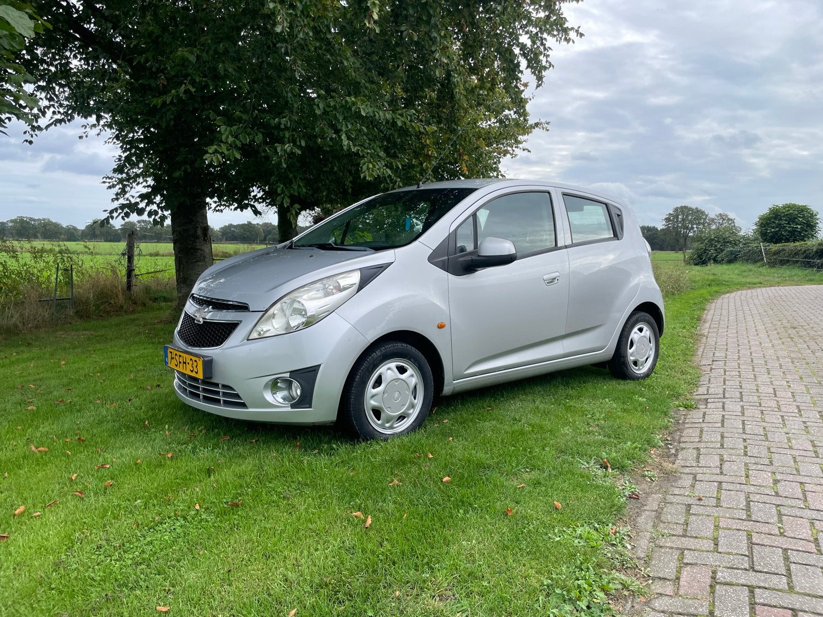 Chevrolet Spark 1.0 2011 Grijs, Voorwielaandrijving, 839 kg, Stof, 4 cilinders