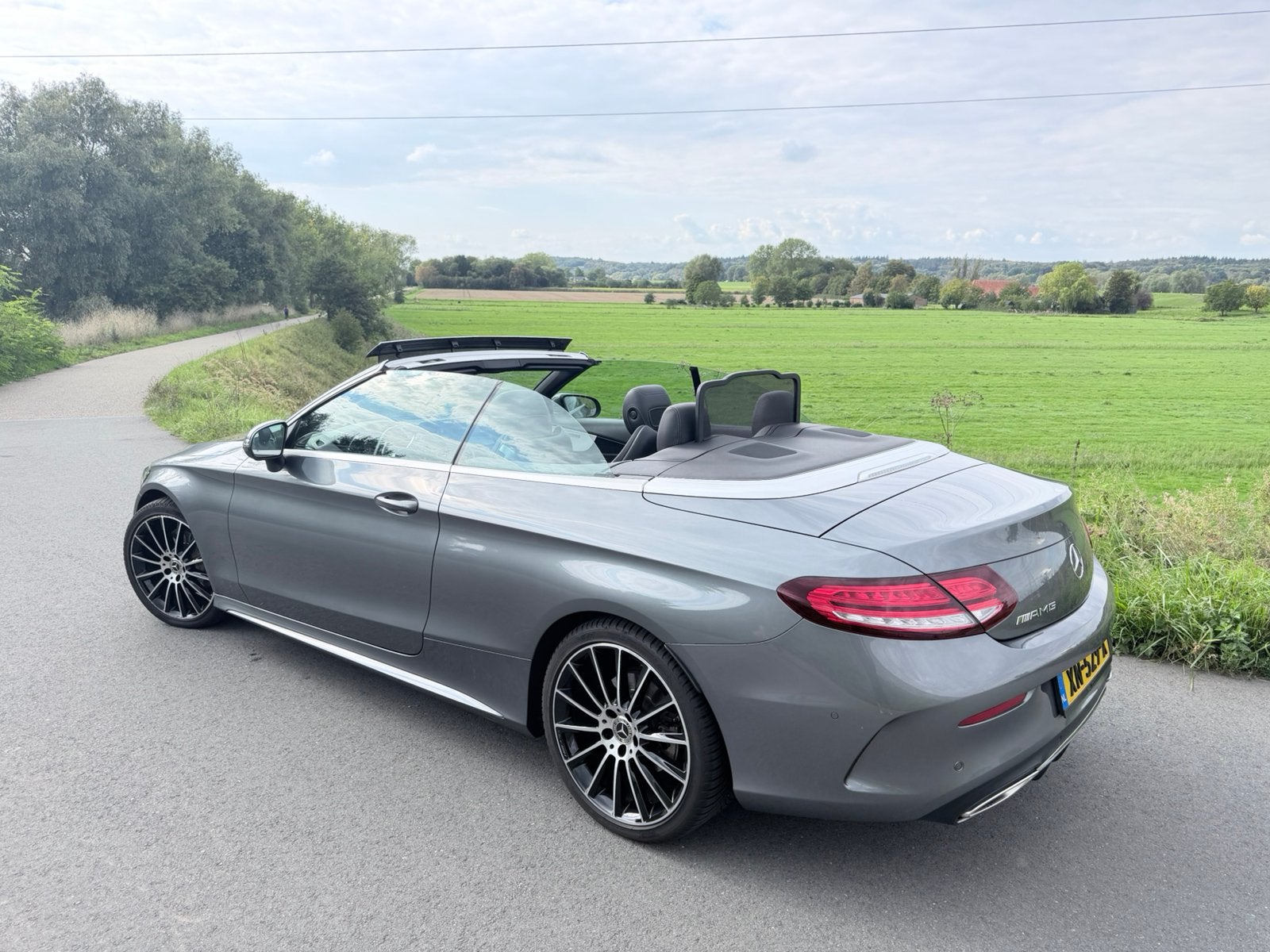 Mercedes-Benz C-Klasse C200 facelift AMG-line audio upgrade, 1800 kg, Zwart, 4 cilinders, Cabriolet
