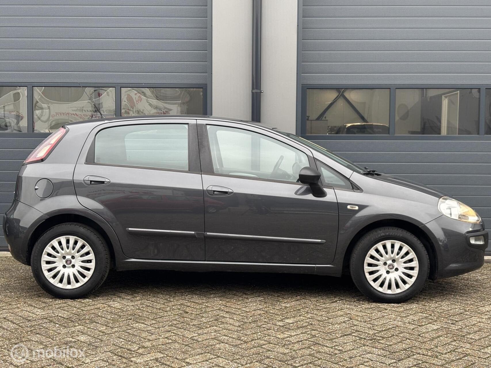 Fiat Punto Evo 1.4 Dynamic Automaat Uitvoering, Auto's, Voorwielaandrijving, Euro 5, 40 €/maand, 4 cilinders