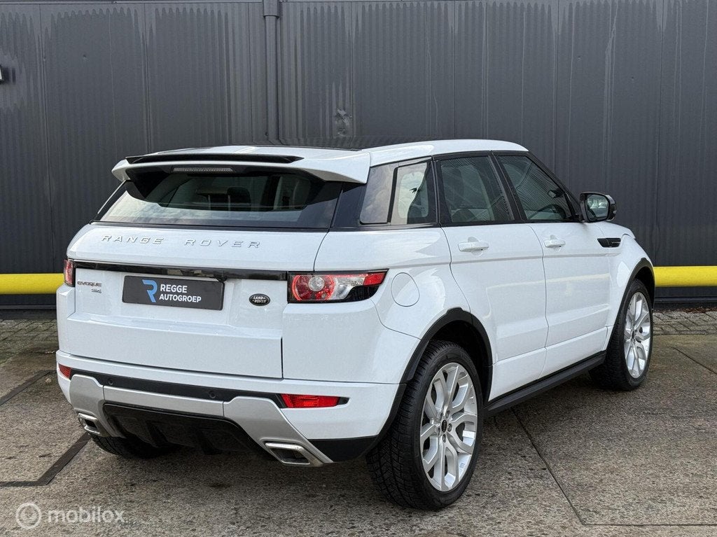 Land Rover Range Rover Evoque 2.0 Si 4WD Dynamic PANORAMADAK, Auto's, Automaat, Euro 5, Wit, Bedrijf