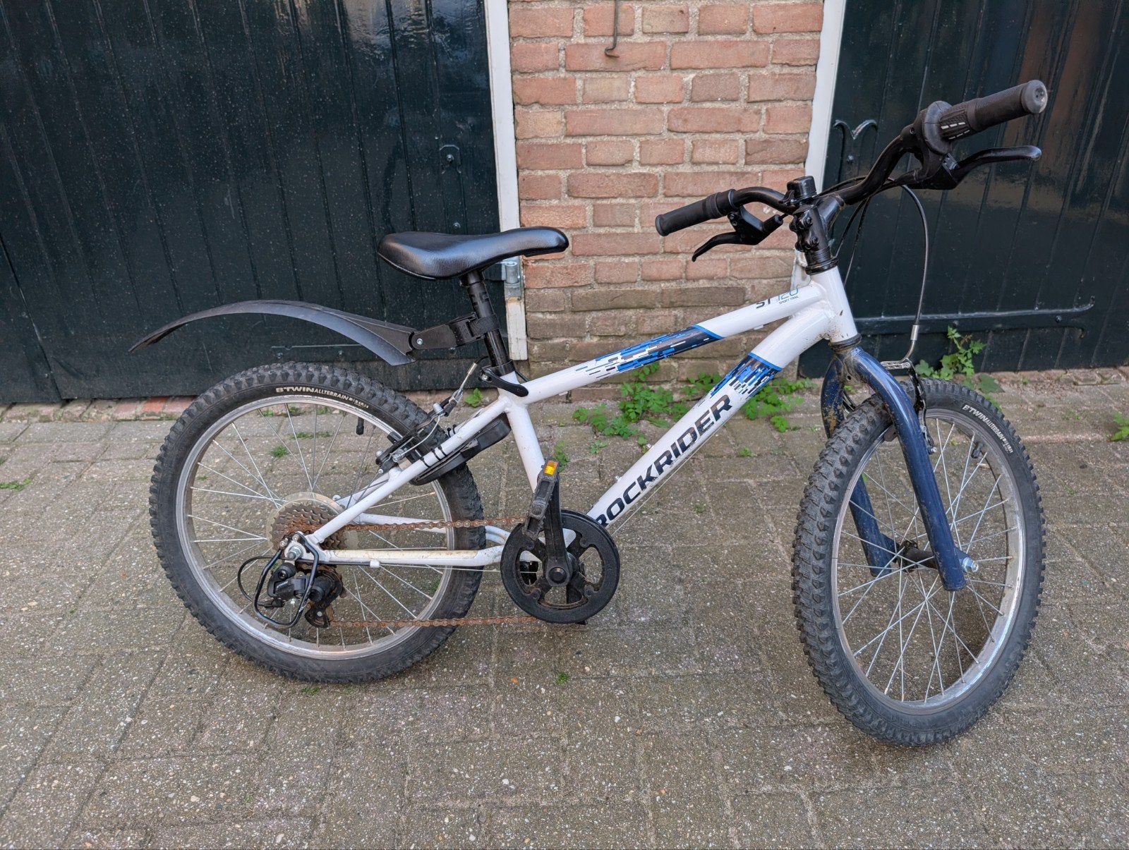 Rockrider ST120 kinderfiets met slot, Ophalen