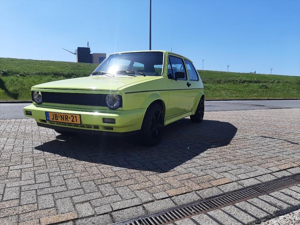 Volkswagen Golf 1.6 GTI 81KW 1982 Geel, Auto's, Voorwielaandrijving, Stof, 4 cilinders, 1600 cc