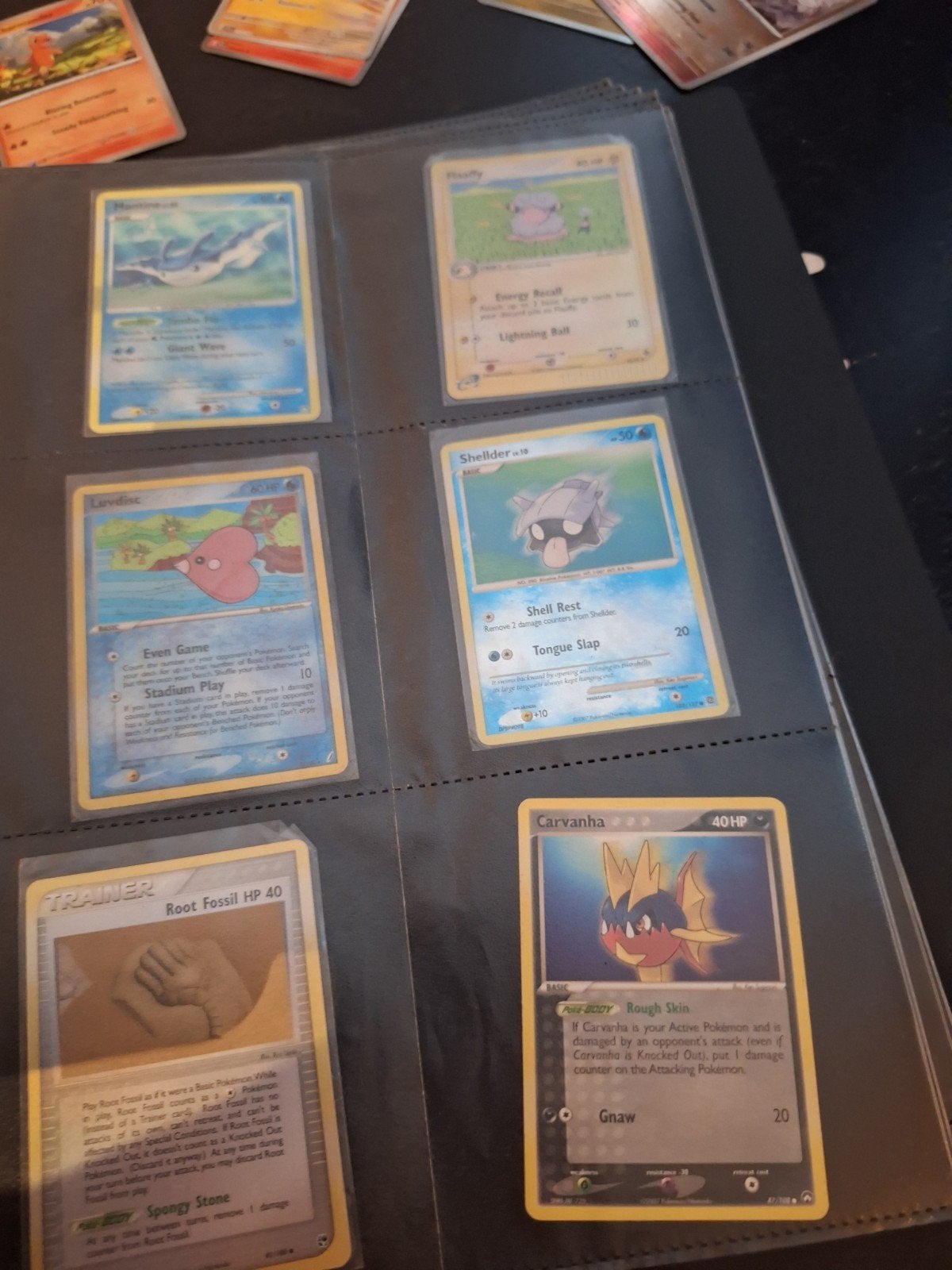 Oude en glimmende Pokémon kaarten in map, Ophalen of Verzenden, Gebruikt, Meerdere kaarten, Foil