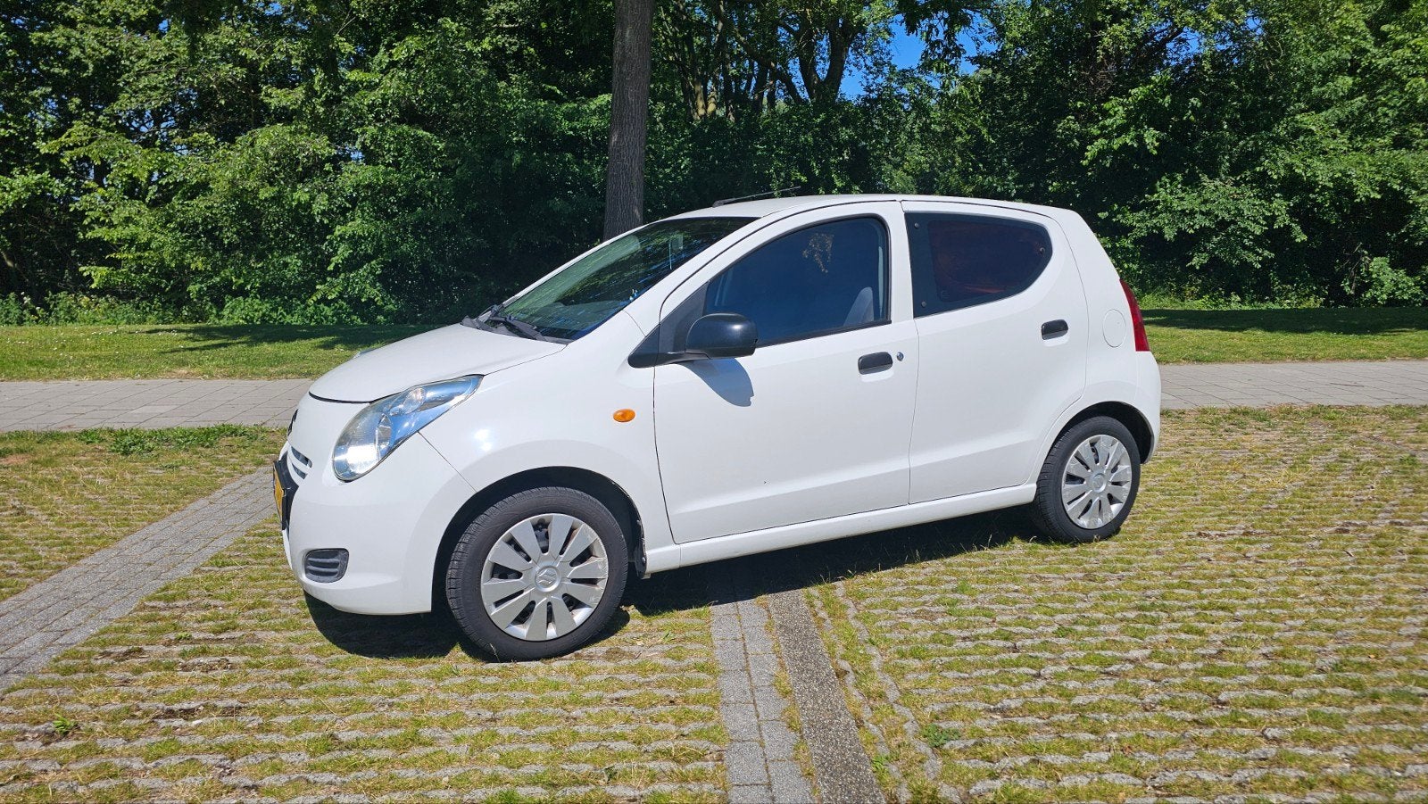 Suzuki Alto 1.0 2014 Wit, Voorwielaandrijving, 4 stoelen, Handgeschakeld, 3 cilinders