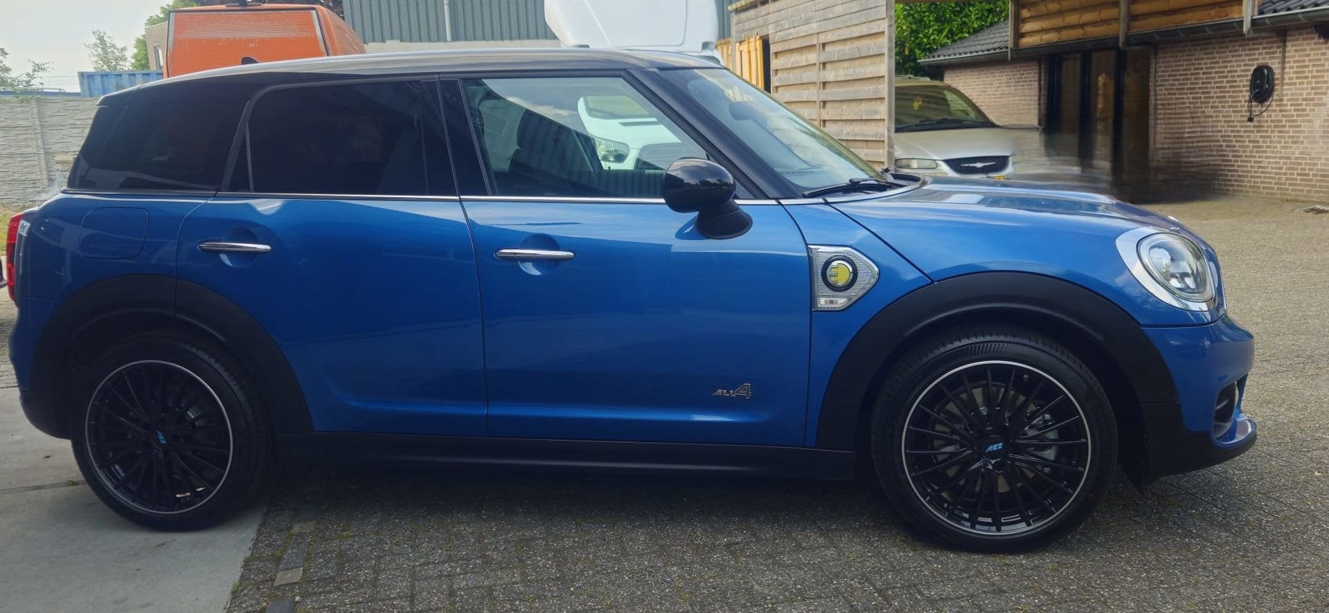 Mini Countryman 1.5 Cooper S E ALL4 Chili/ CARPLAY/ LUXE INT, Auto's, Mini, Dealer onderhouden, Gebruikt, Blauw, Leder en Stof