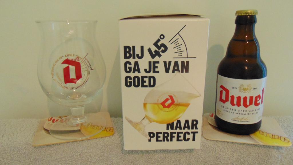 Duvel Exclusive 45 graden glas + 1 Duvel met viltjes, Ophalen of Verzenden, Zo goed als nieuw, Glas of Glazen, Duvel