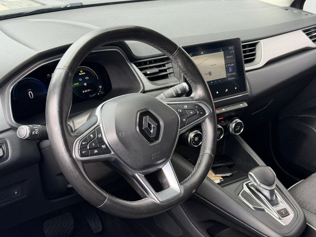 Renault Captur 1.6 E-Tech Plug-in Hybrid 160 Serie Limitée, Auto's, Renault, 77 km/l, Gebruikt, 4 cilinders, Leder en Stof