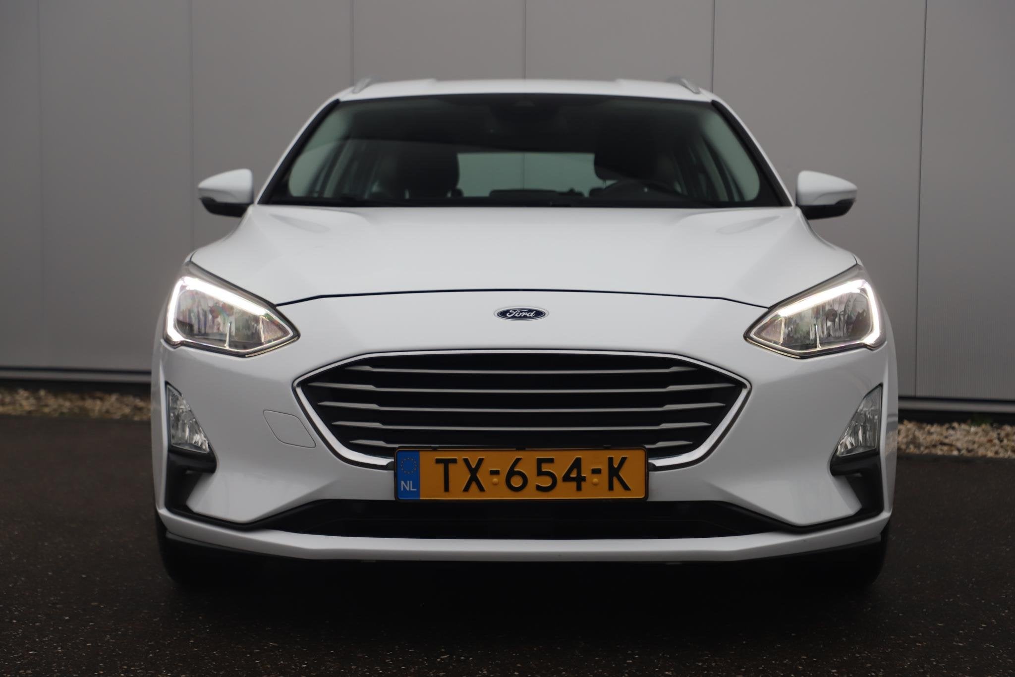 Ford Focus Wagon 1.0 EcoBoost Trend Edition Business Navigat, Auto's, Gebruikt, Euro 6, Met garantie (alle), 1283 kg