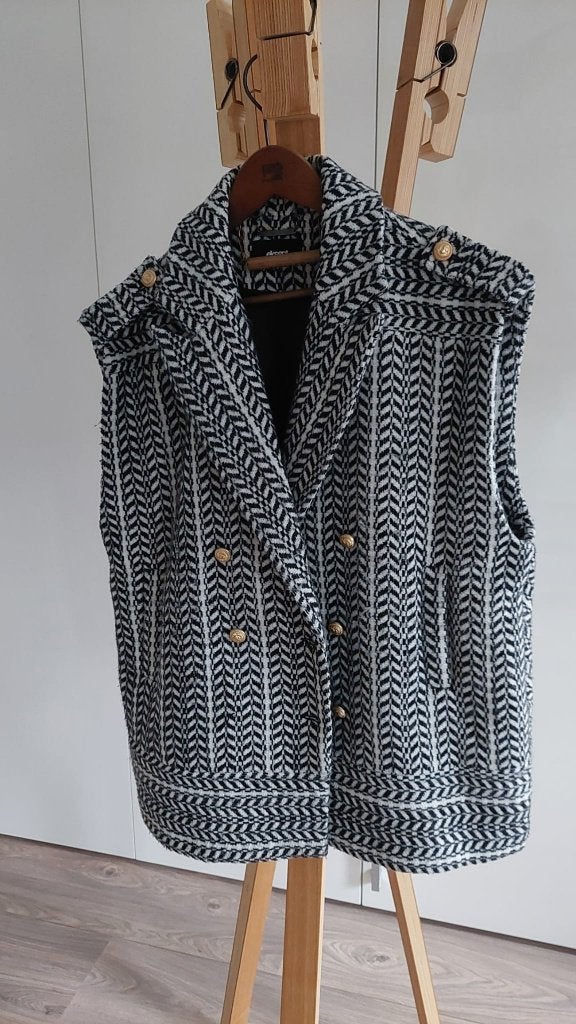Leuk mouwloos vest, Ophalen of Verzenden, Zo goed als nieuw, Maat 42/44 (L), Zwart