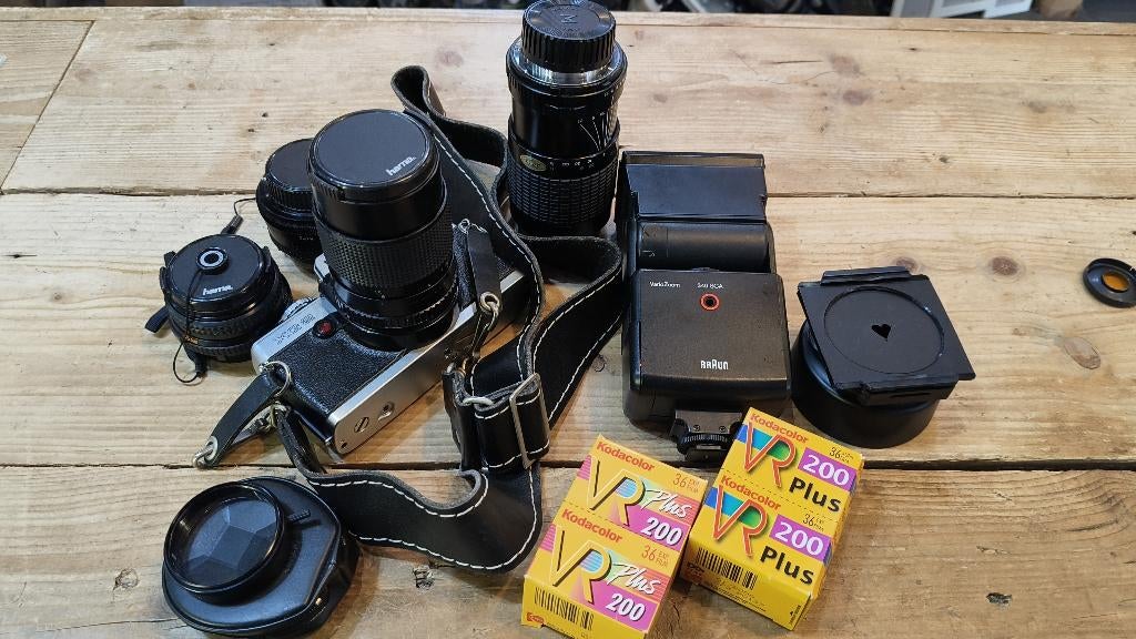 Minolta XG-2 set met lenzen, filters, flitser en film, Ophalen of Verzenden, Gebruikt, Spiegelreflex, Minolta