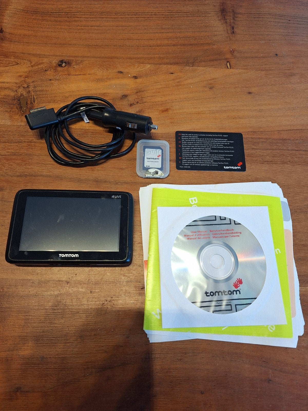 TomTom GO LIVE 1000 navigatiesysteem met oplader, Ophalen of Verzenden, Gebruikt