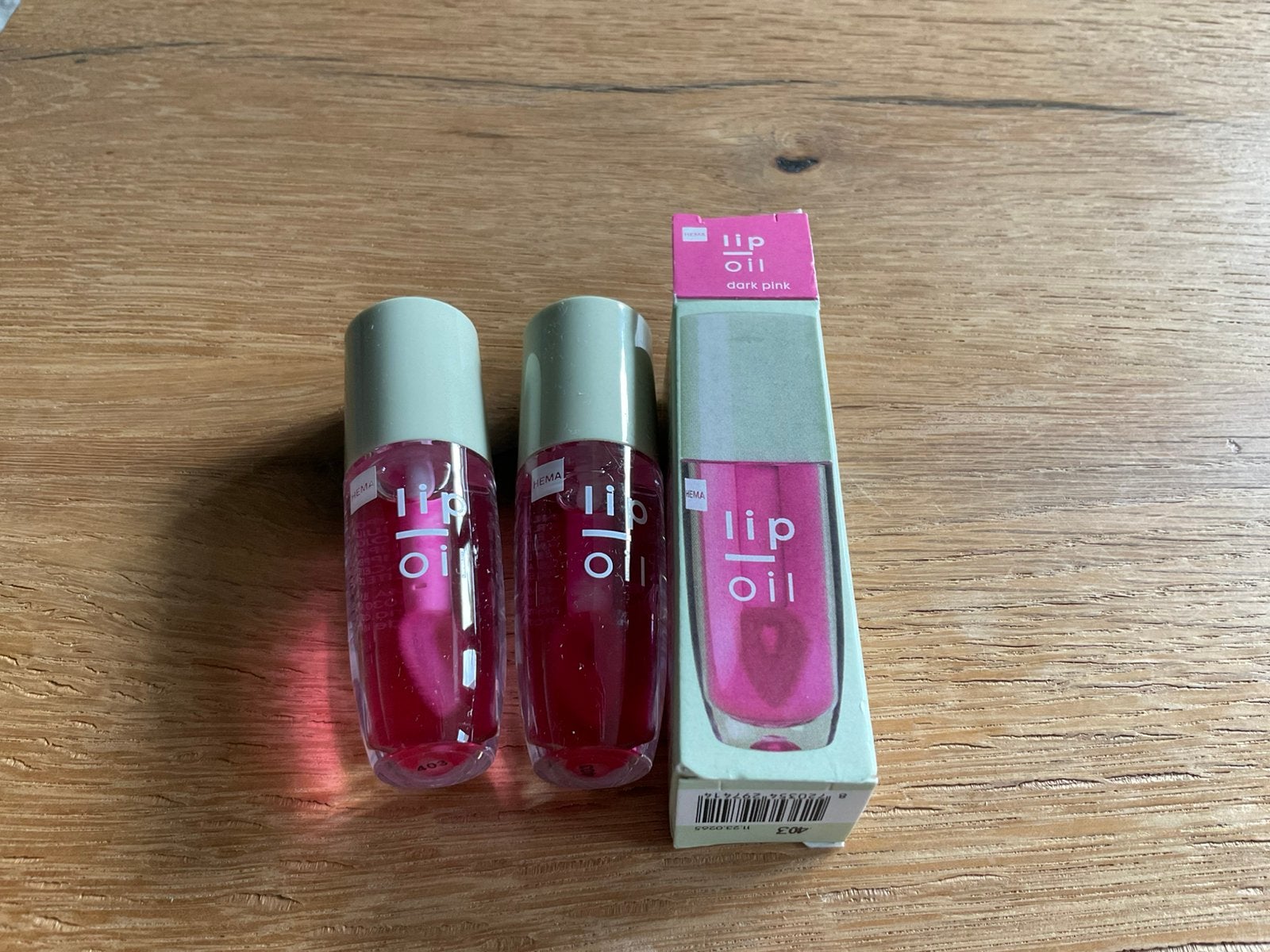Hema lipolie - dark pink / 2 flesjes, Lippen, Nieuw, Ophalen of Verzenden, Make-up