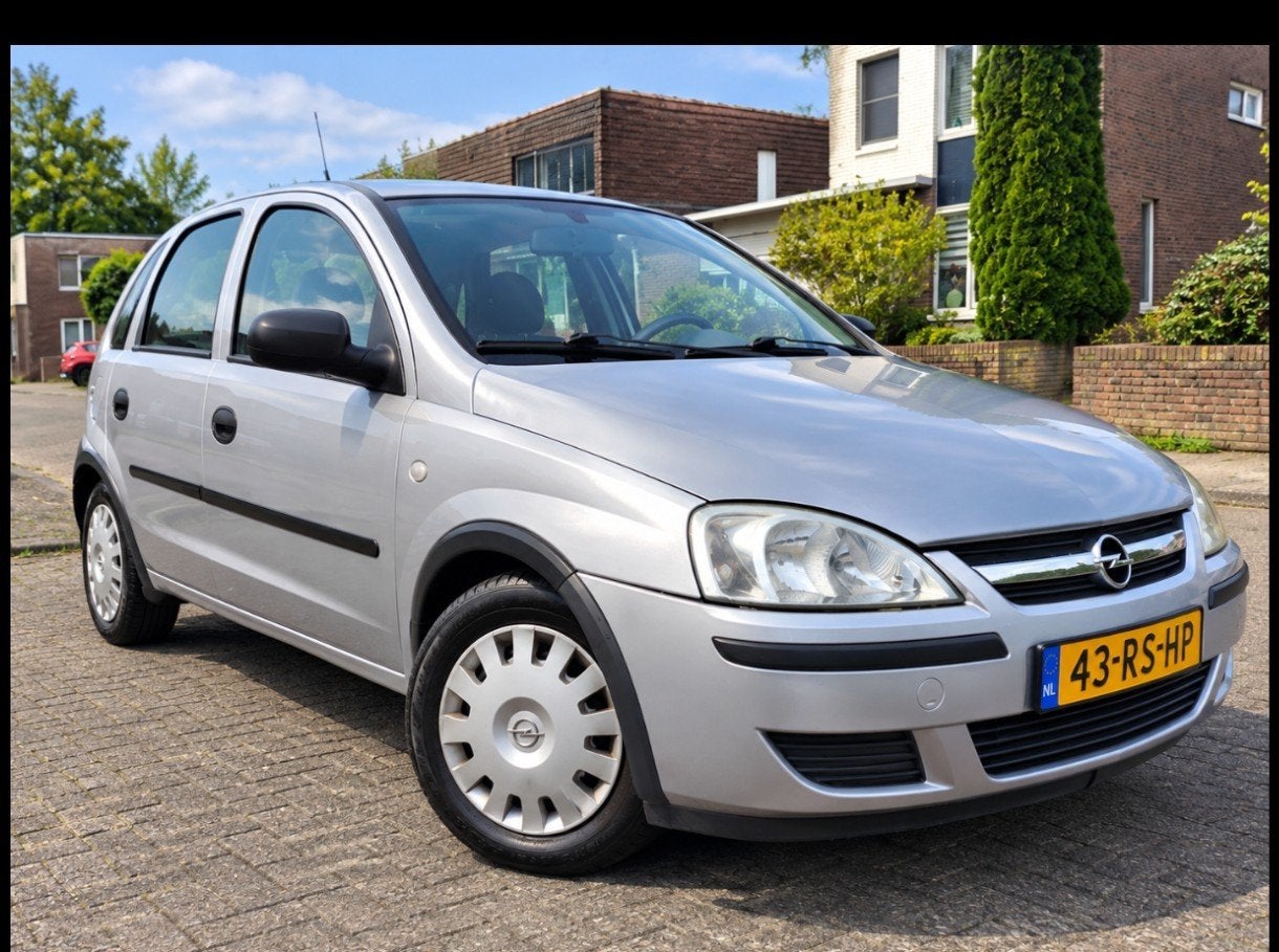 Opel Corsa 1.2 16V Twinport 5D 2005 Grijs, Auto's, Voorwielaandrijving, 4 cilinders, 1229 cc, Origineel Nederlands