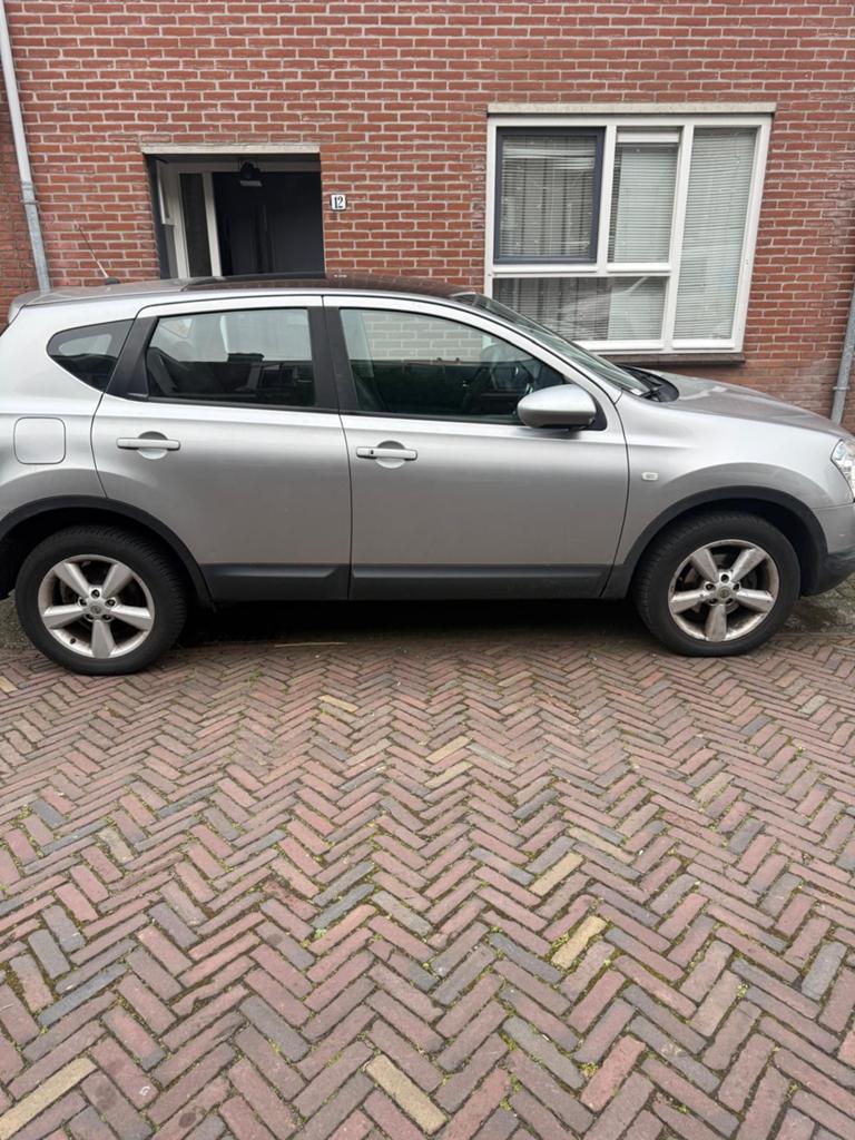 Nissan Qashqai 2.0 DCI 4WD AUT 2008 Grijs, Auto's, Nissan, Euro 5, 1995 cc, 4 cilinders, Leder en Stof