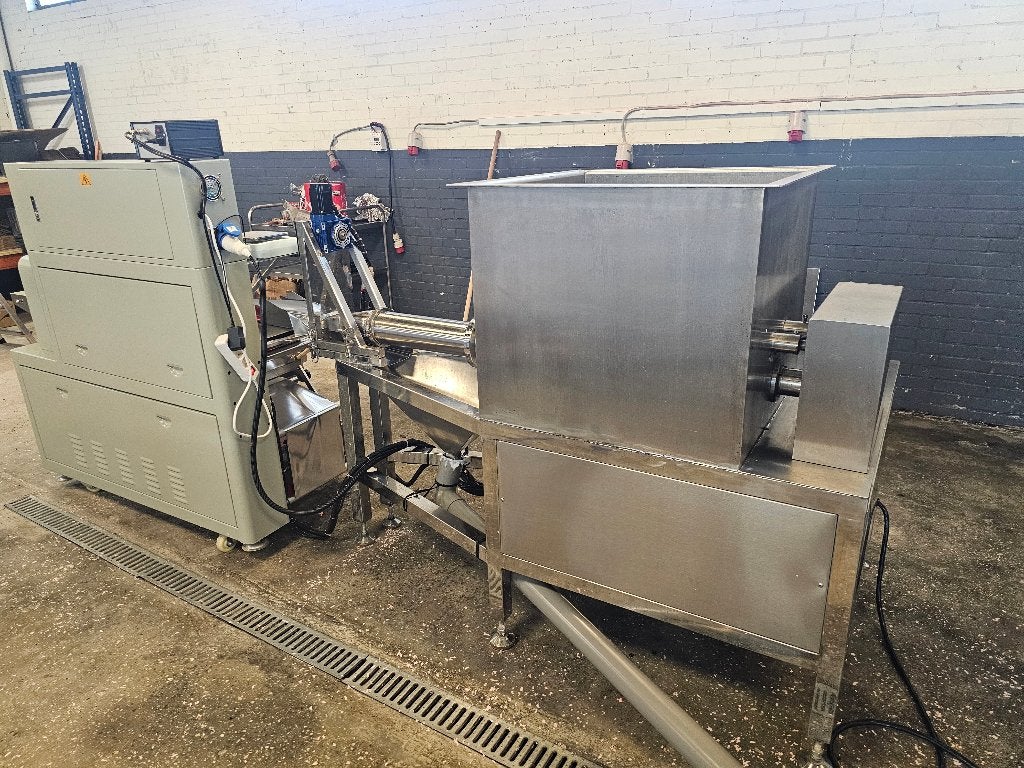 Complete verpakkings-/extruderlijn (extruder + flow‑pack), Ophalen