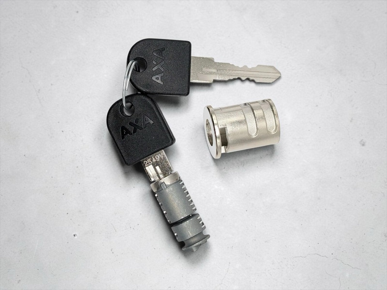 Stella SlimFit accuslot cilinder met 2 AXA sleutels - Nieuw!, Verzenden, Nieuw, Elektrische fiets, Overige typen