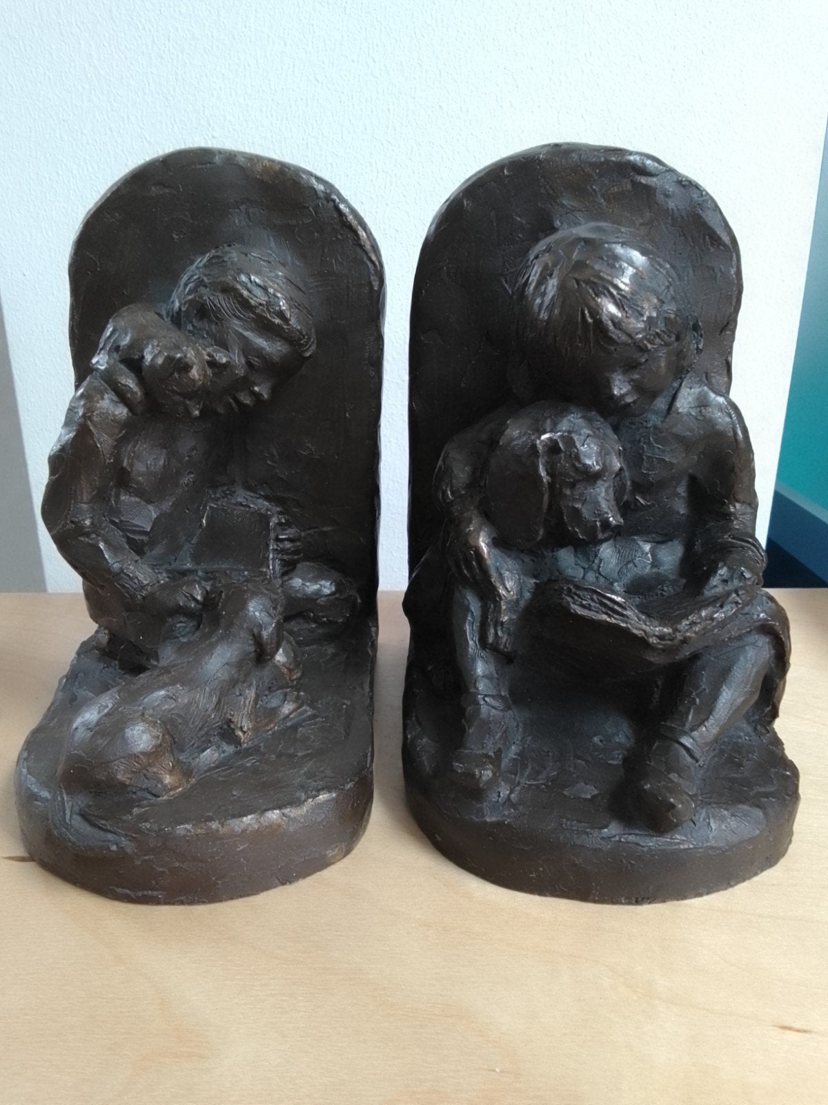 2 zware boekensteunen, jongen en meisje, brons-look, Ophalen of Verzenden, Zo goed als nieuw