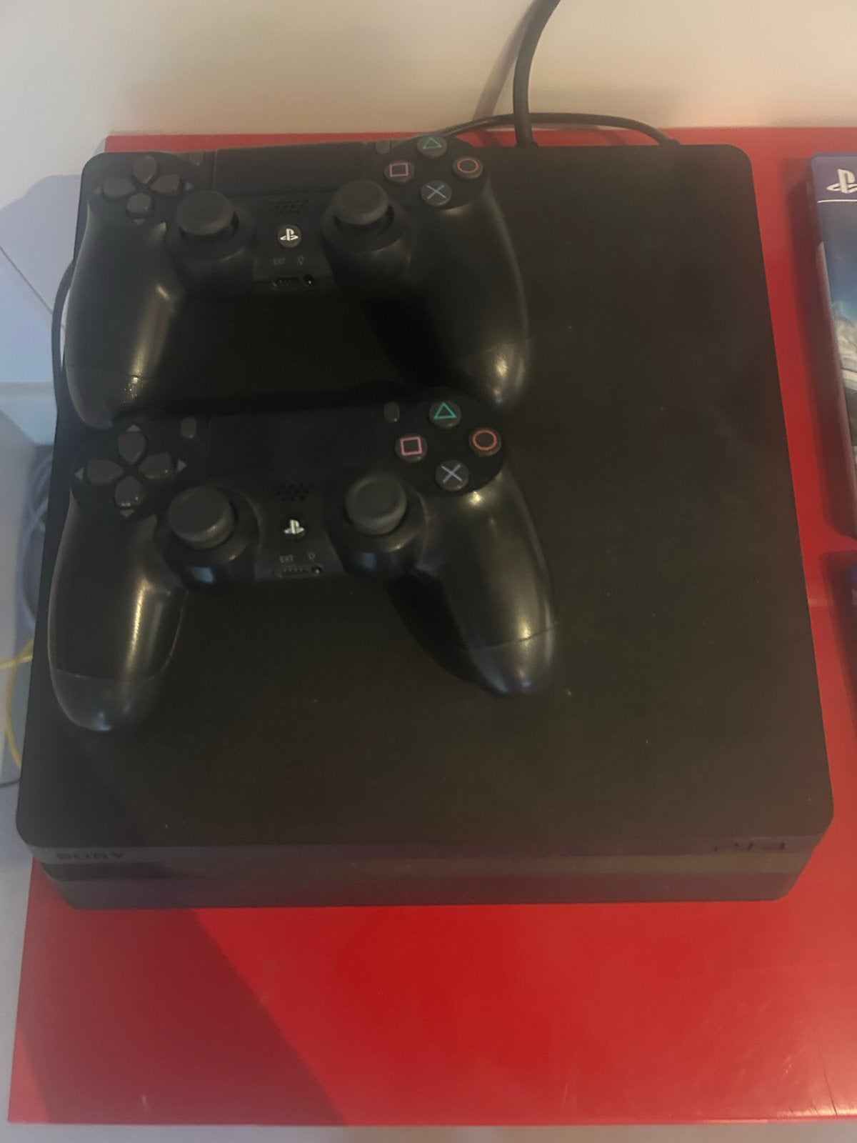 PlayStation 4 Slim met 2 controllers, SSD en 4 games, Ophalen, Gebruikt